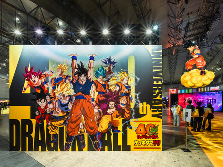 chiba, makuhari - jan 25 2026: A giant Japanese mural and an inflatable Goku on a Nimbus cloud show...