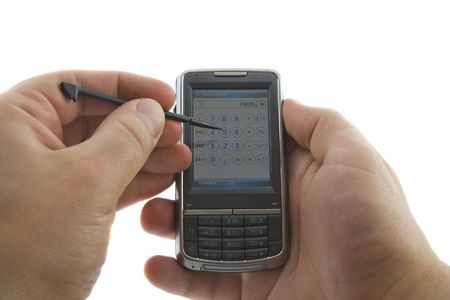 Handhedl computer in hands, isolated whiteの写真素材