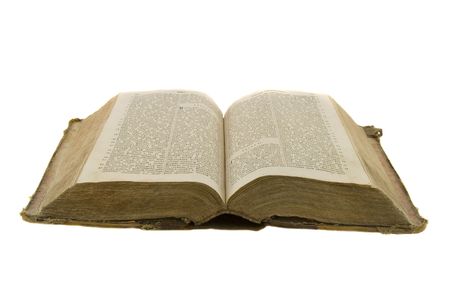 Vintage open book bible open for reading isolated on whiteの写真素材