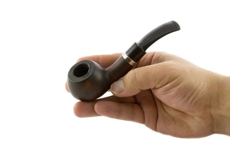 Hand of man with a smoking tobacco-pipe isolated over whiteの写真素材