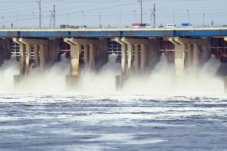 Reset of water on hydroelectric power station on riverの写真素材