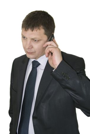 Businessman discussing to the mobile phoneの写真素材
