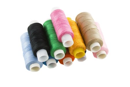 Many colorful threads over the white backgroundの写真素材