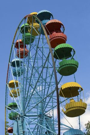 Wheel of review in the park on blue sky backgroundの写真素材