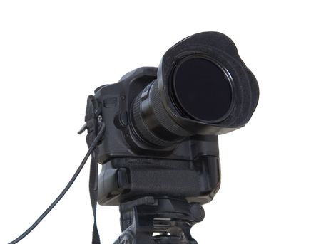Professional photo camera isolated over white backgroundの写真素材