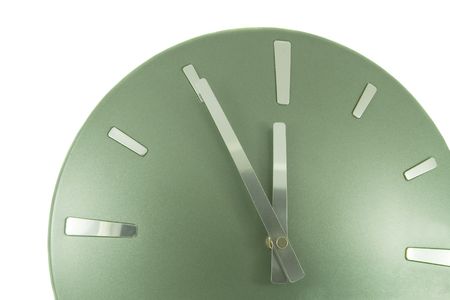 Clock (5 minutes to 12) over white