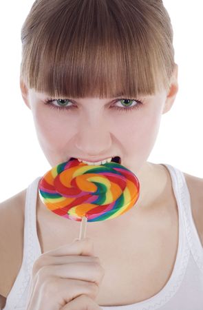 Bright picture of hungry blonde with color lollipopの写真素材