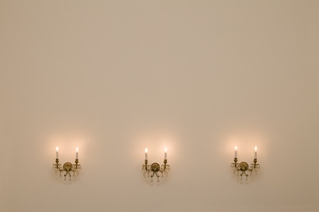 Interior of vintage room with three antique wall lamps.の写真素材