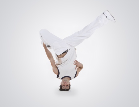 Teenager dancing breakdance in action Teenager dancing breakdance in action