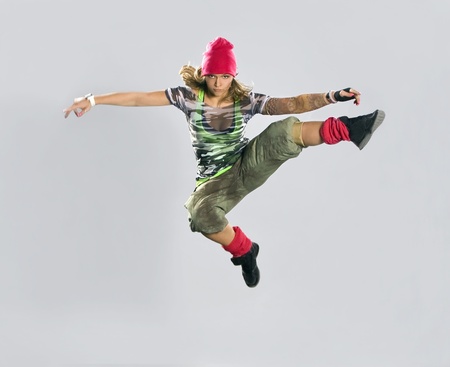 Teenage girl dancing breakdance in actionの写真素材
