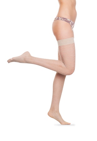 beautiful woman legs in white stockingsの写真素材