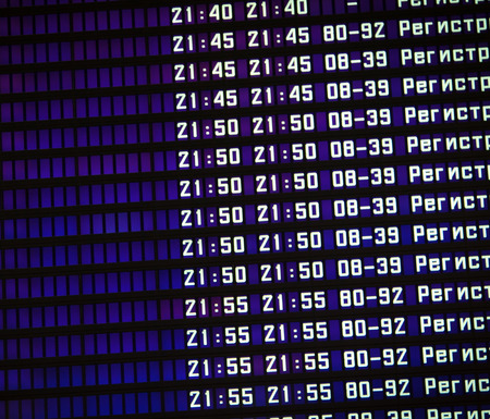Flights information board in airport terminalの写真素材