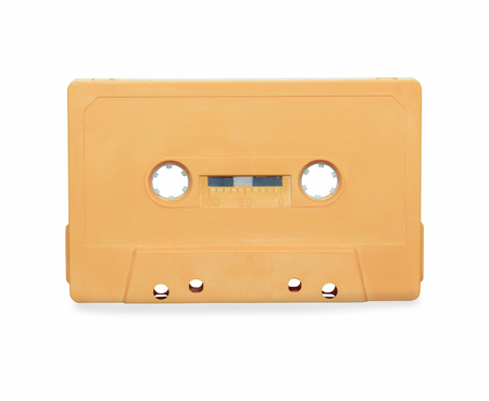 Vintage orange audio cassette tape isolated over white backgroundの写真素材