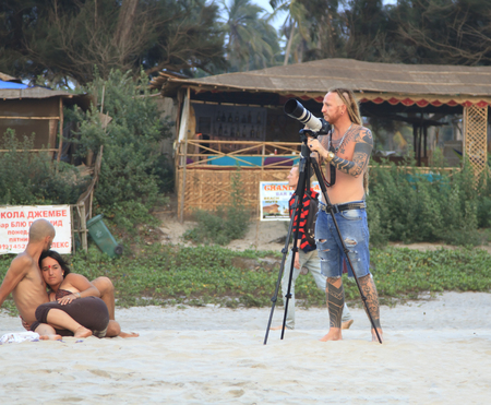 Goa, India - February 15, 2016: Unidentified people relaxing on the Arambol beach.のeditorial素材