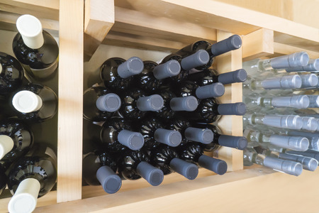 Wine bottleson the rack in the warehouse