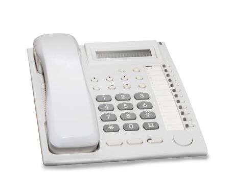 Office table phone isolated over whiteの写真素材