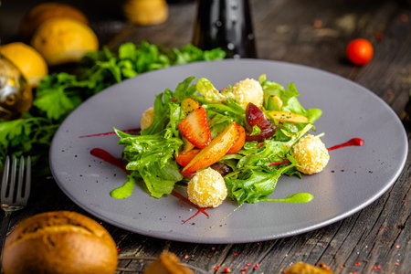 Salad with arugula, cherry tomatoes and croutonsの写真素材