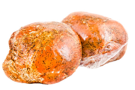 smoked pork meat isolated on a white background.の写真素材