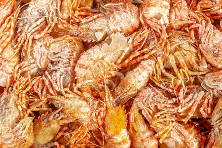 Fresh raw shrimps for sale in the market. Seafood backgroundの写真素材