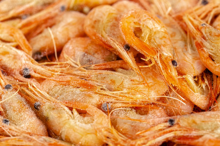 close up of fried shrimps on a wooden board. macroの写真素材