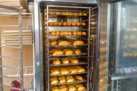 Bread in the oven in the bakery shop. Bakery industry