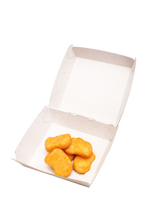 Chicken nuggets in paper box isolated on white background. Top view.の写真素材