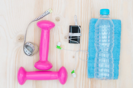 things on the table sports and pink dumbbellの写真素材