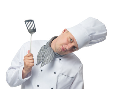 chef with a shovel in his hand a place for an inscription from the topの写真素材