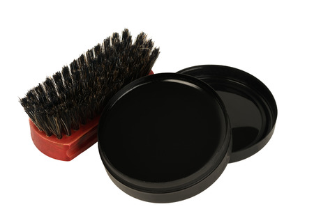 Brush shoes with black jar of creamの写真素材