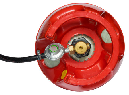 red gas cylinder with a gearbox attached to itの写真素材