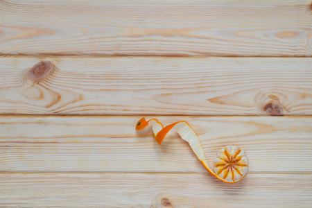 beautifully peeled tangerine on the tableの写真素材