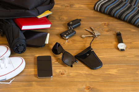 Men's items from the bag on the tableの写真素材