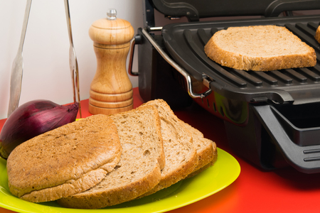 cooking bread grilled with seasoning for breakfastの写真素材