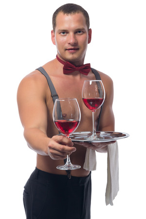bartender gives red wine to you on a white backgroundの写真素材
