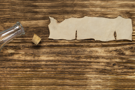 lying on the table a piece of paper out of the bottle, a place inscription spaceの写真素材