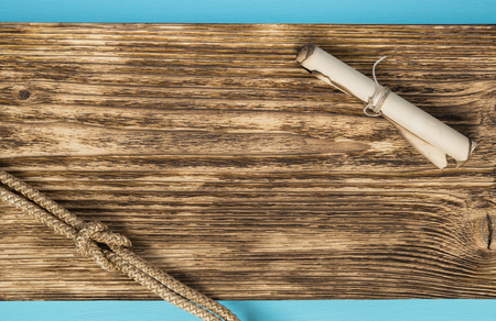 rope with a nice scroll on a wooden boardの写真素材