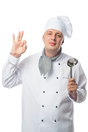 Portrait of a chef that shows hand signの写真素材