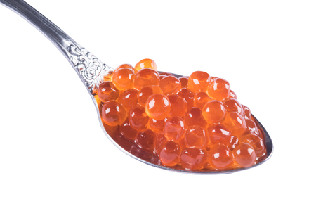 red caviar in spoon on white backgroundの写真素材