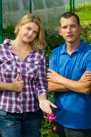 male and female florist at a rose show that all is well;の写真素材