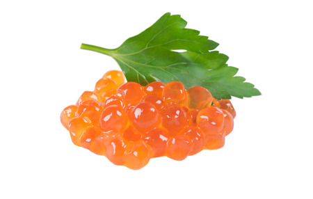 pile of red caviar on a white background with parsleyの写真素材