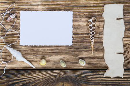 Framework for a photo and an inscription on a wooden tableの写真素材