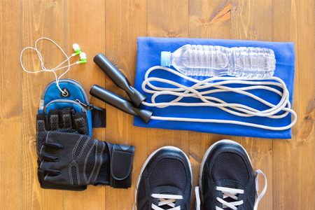 things for sports with music on wooden backgroundの写真素材