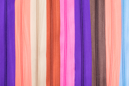 Many multicolored lightning are located verticallyの写真素材