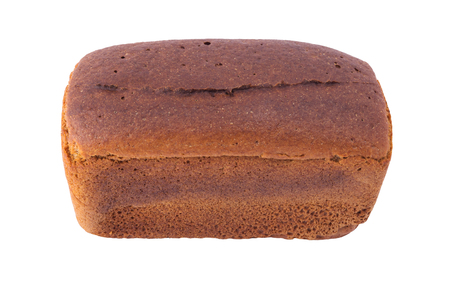 Square rye bread with a black top on a white background isolatedの写真素材