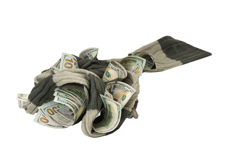 dollars entangled in a soft scarf on a white backgroundの写真素材