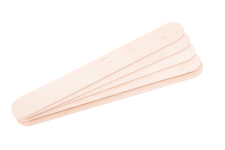 Sticks of wood for wax and spa, isolated on white backgroundの写真素材