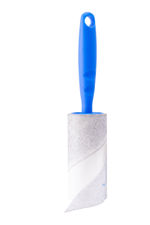 white sticky brush for cleaning of clothes and furniture from dust isolated on white backgroundの写真素材