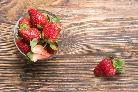 strawberry from the bowl is in the sideの写真素材