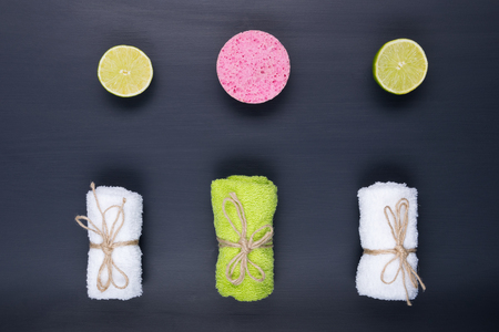 set of towels on a black background and limeの写真素材