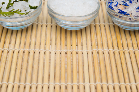 white salt with the addition of trees for spa treatments on the tableの写真素材